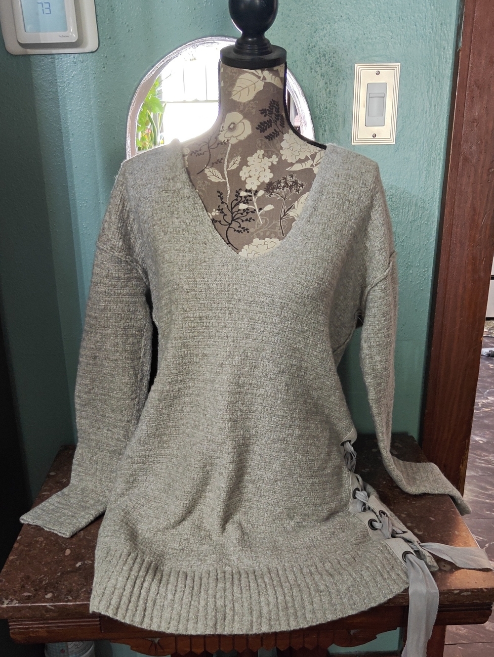 Free People Women's Light Gray V-Neck Sweater with Side Lace-Up Detail
